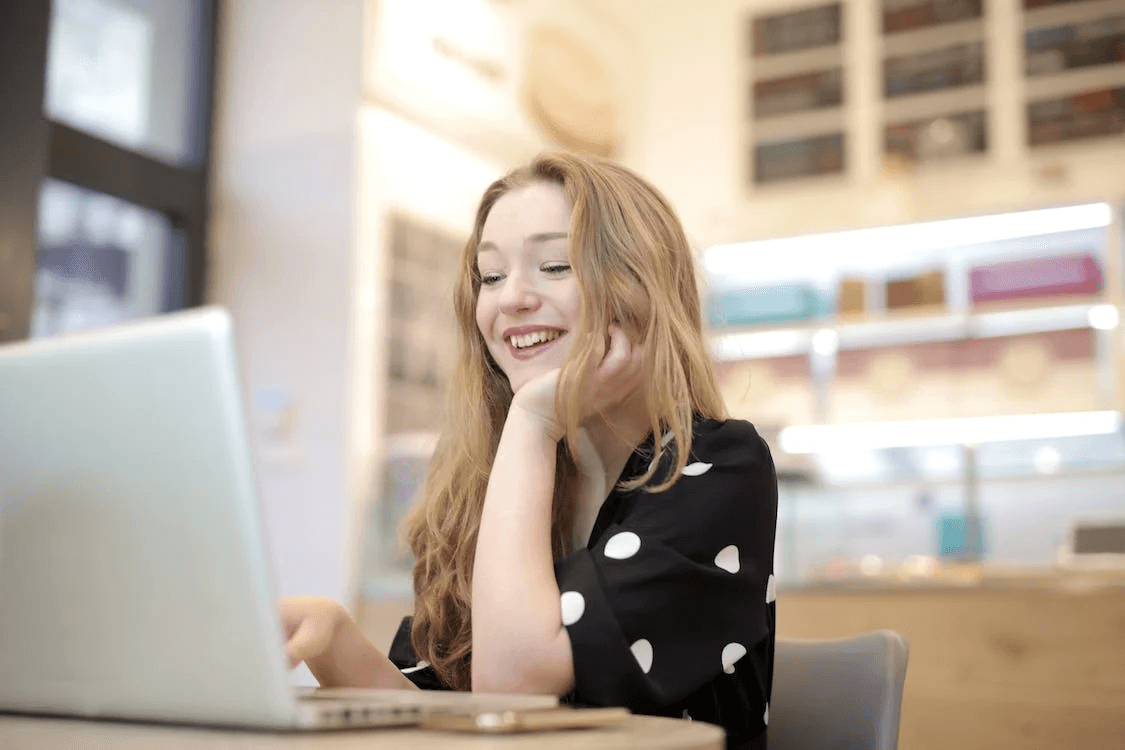 a woman using a laptop
