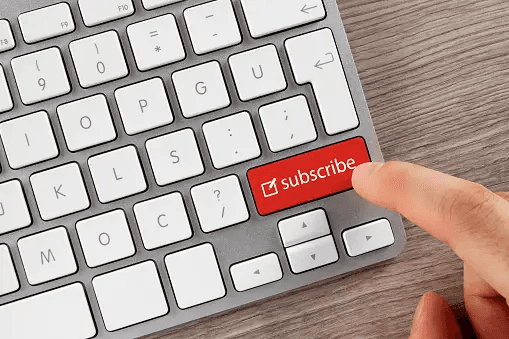 a keyboard with a subscribe button